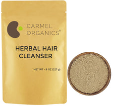 CARMEL ORGANICS front label of 8 ounce herbal hair cleanser showing product name and benefits