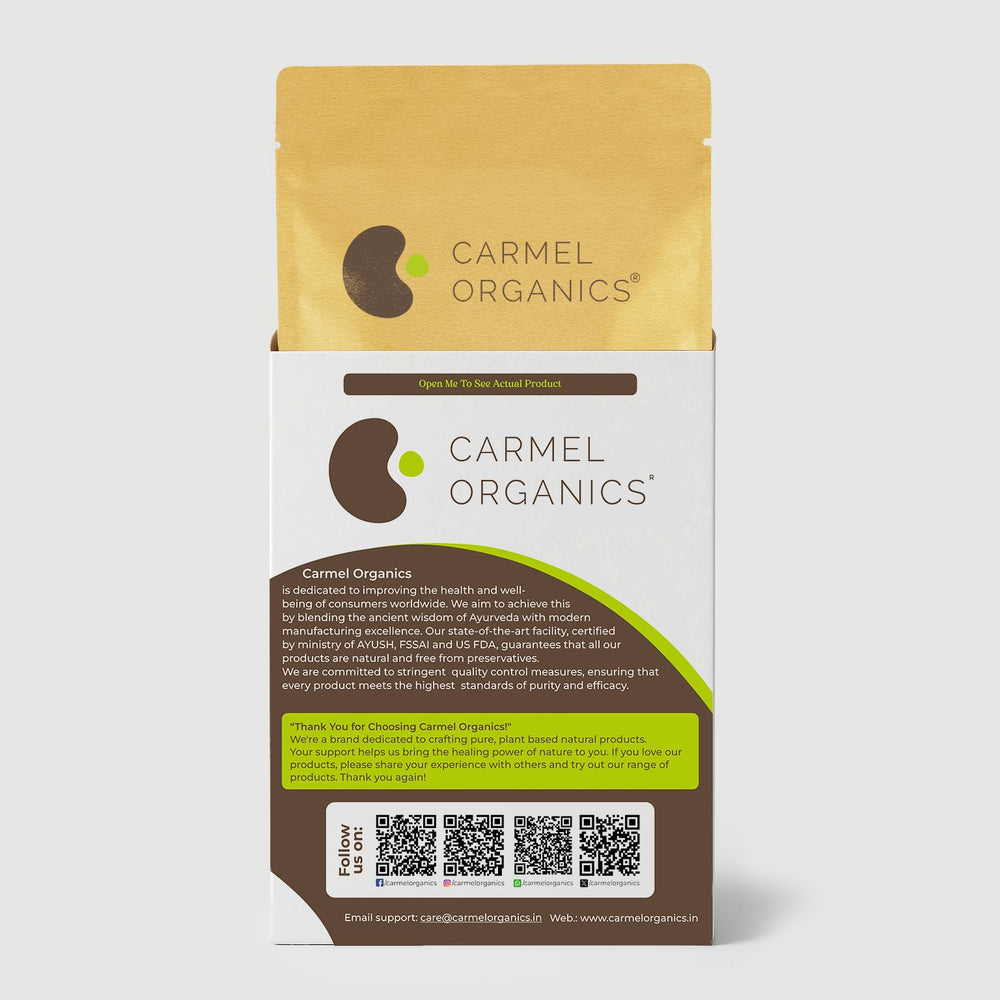 Measuring spoon with CARMEL ORGANICS shikakai powder showing easy portioning