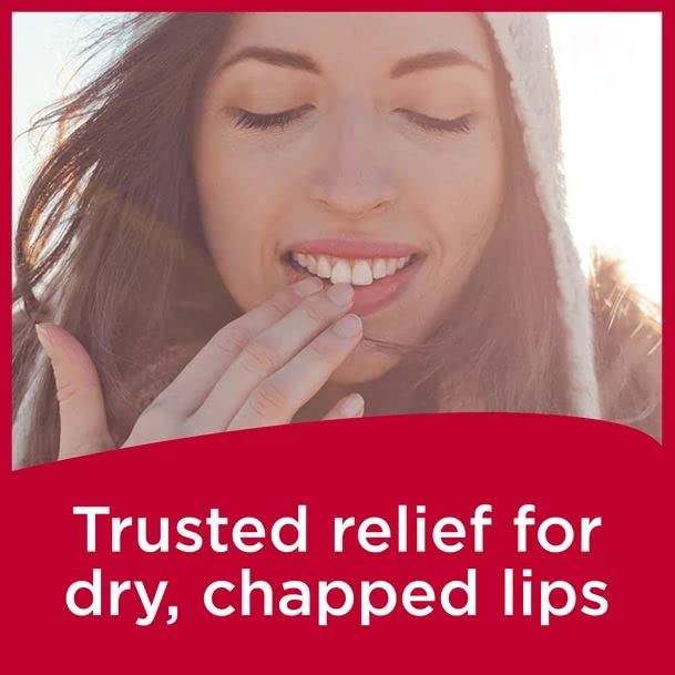 applying Carmex to lips demonstrating soothing, cooling lip comfort