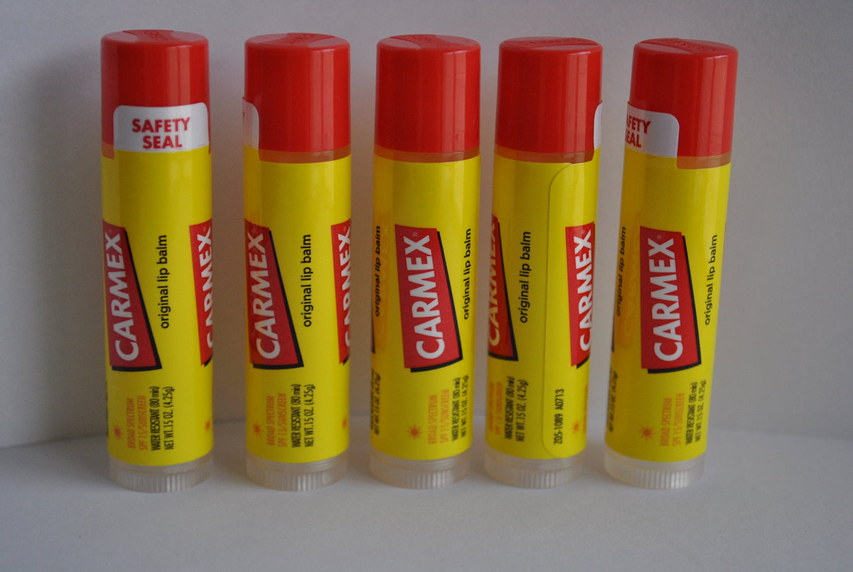 Carmex jar front view showing label and compact size for easy carrying