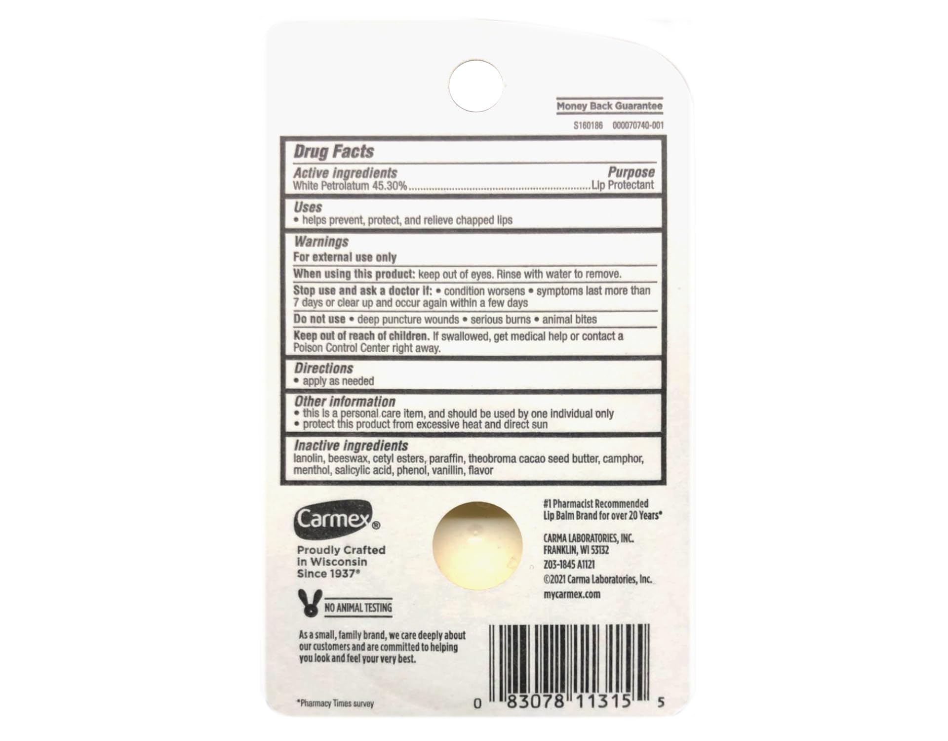 Carmex original pot on a nightstand next to a glass of water, ideal for nighttime lip care