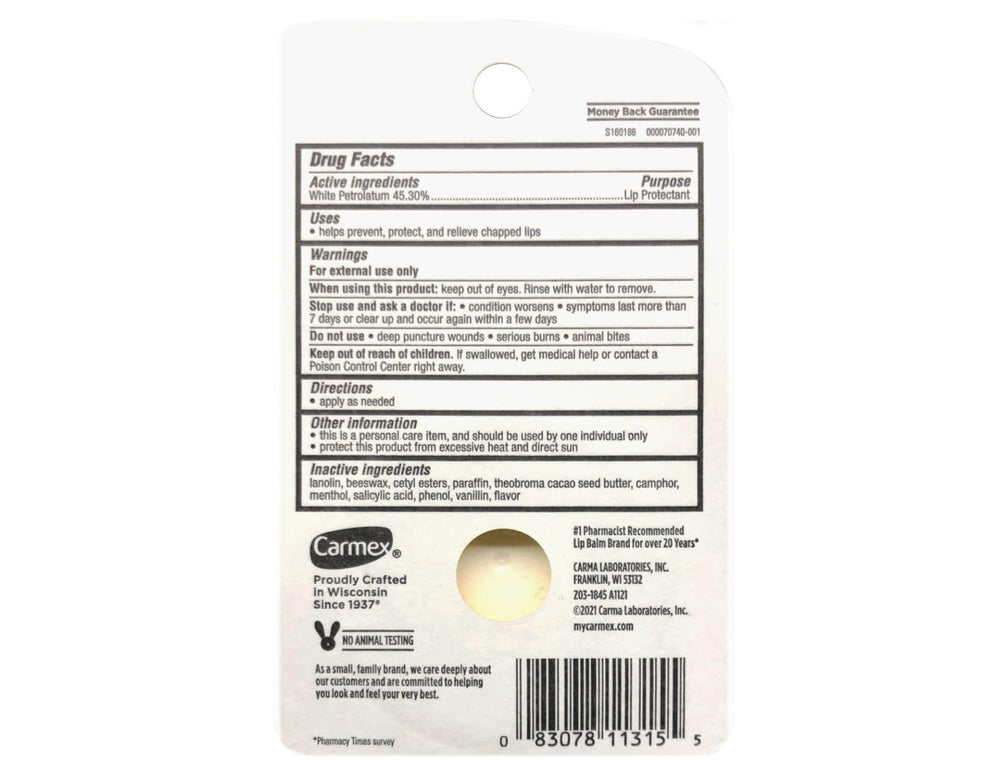 Carmex original pot on a nightstand next to a glass of water, ideal for nighttime lip care