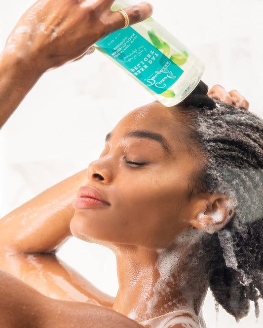 Carol's Daughter applicator close-up highlighting precise scalp delivery and convenience