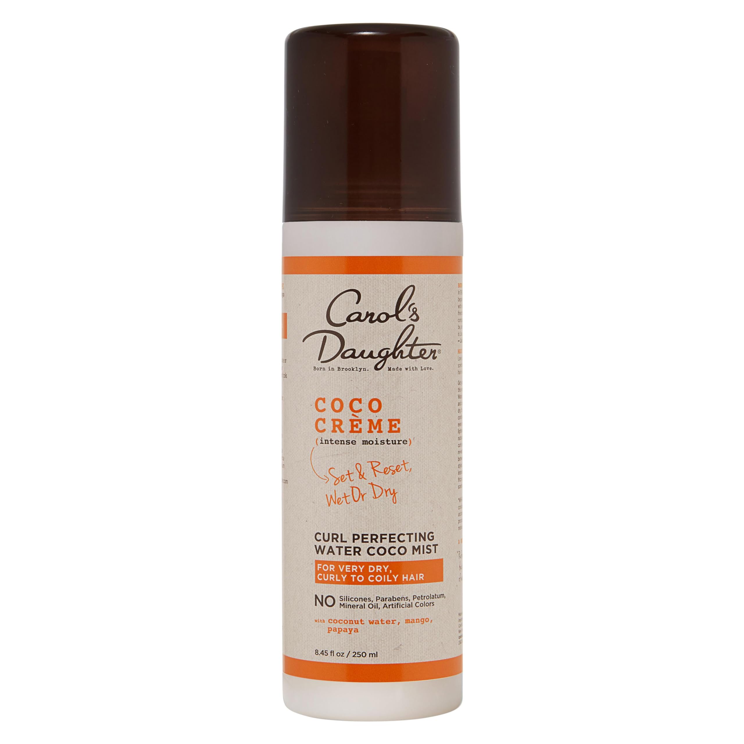 Carol's Daughter front bottle view showing label and coconut scent benefit