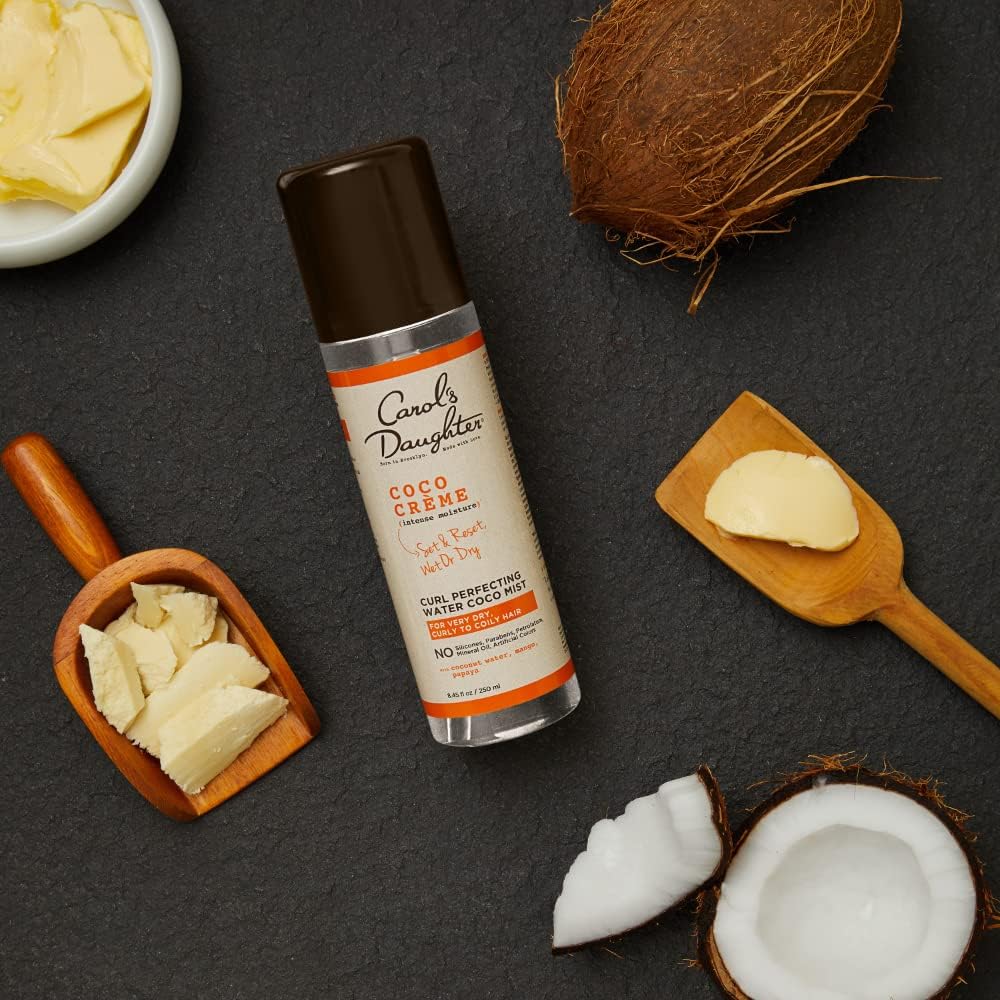 Carol's Daughter misting hair to refresh curls and restore bounce benefit