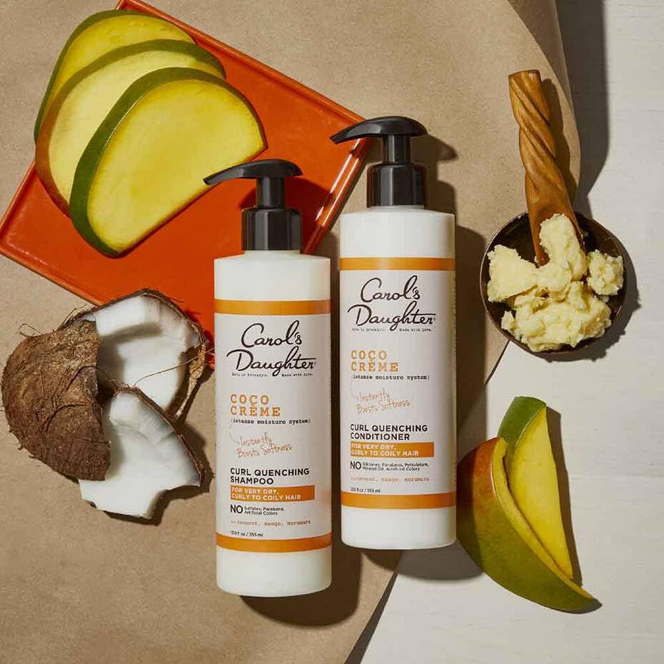 Carol's Daughter conditioner on bathroom shelf with towel conveying a nourishing self-care routine