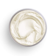 Carol's Daughter tub held in hand to show 12 oz scale and convenient at-home use
