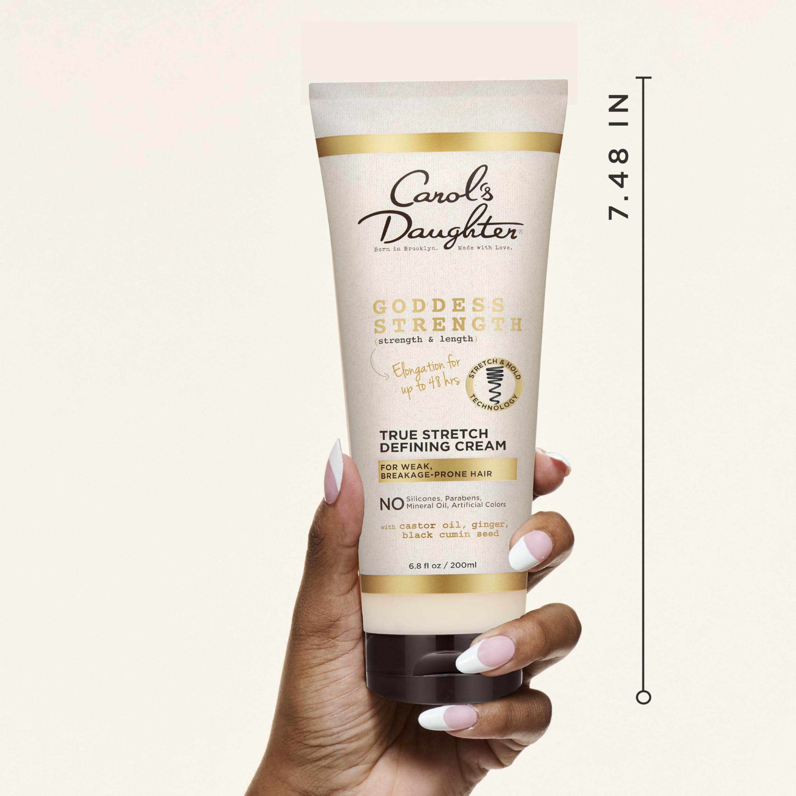 Carol's Daughter cream texture in open jar demonstrating rich moisturizing feel