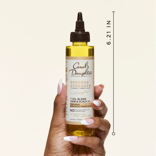 Carol's Daughter applicator tip close-up for precise scalp placement