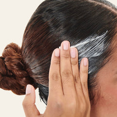 Carol's Daughter ingredients shot highlighting castor oil benefits for strength