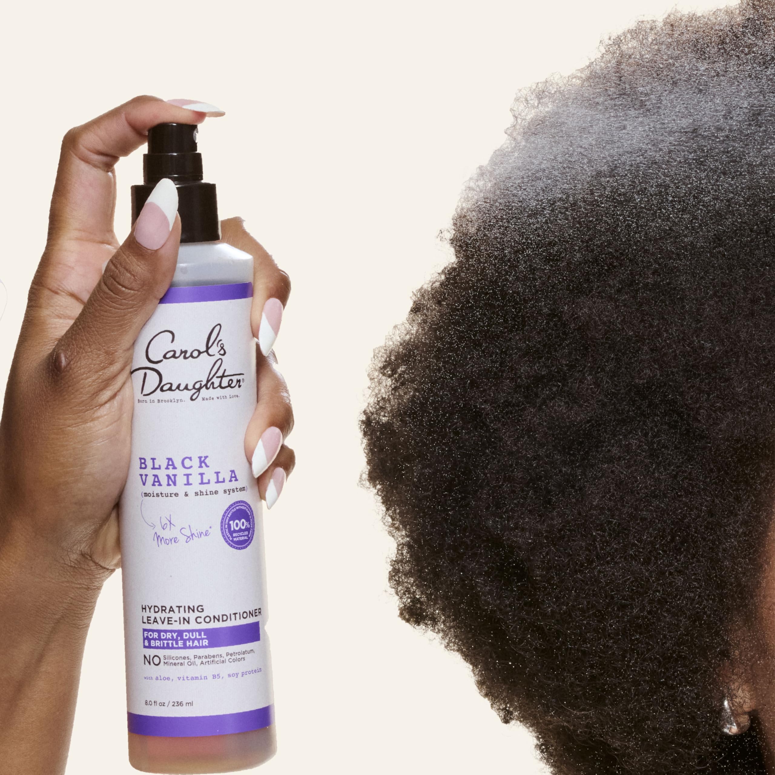 Carol's Daughter spray mist demonstrating fine atomized spray for even coverage
