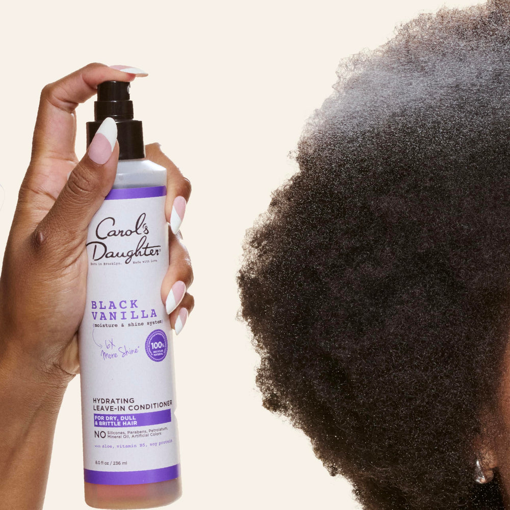 Carol's Daughter spray mist demonstrating fine atomized spray for even coverage