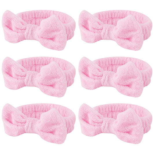 Casoty front view of six pink headbands showing neat packaging and appeal