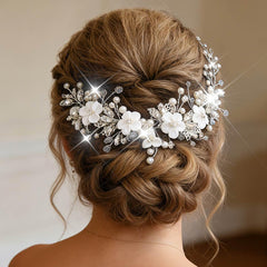 Catery front view of silver flower headpiece showing full design and balance