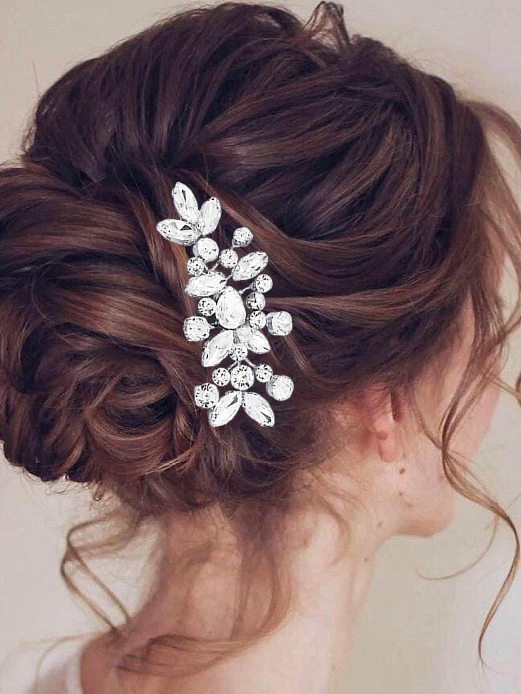 Catery comb inserted in bridal updo showing secure hold and polished finish benefit