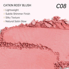Model applying Catkin blush on cheeks showing fresh glow and wearable shimmer