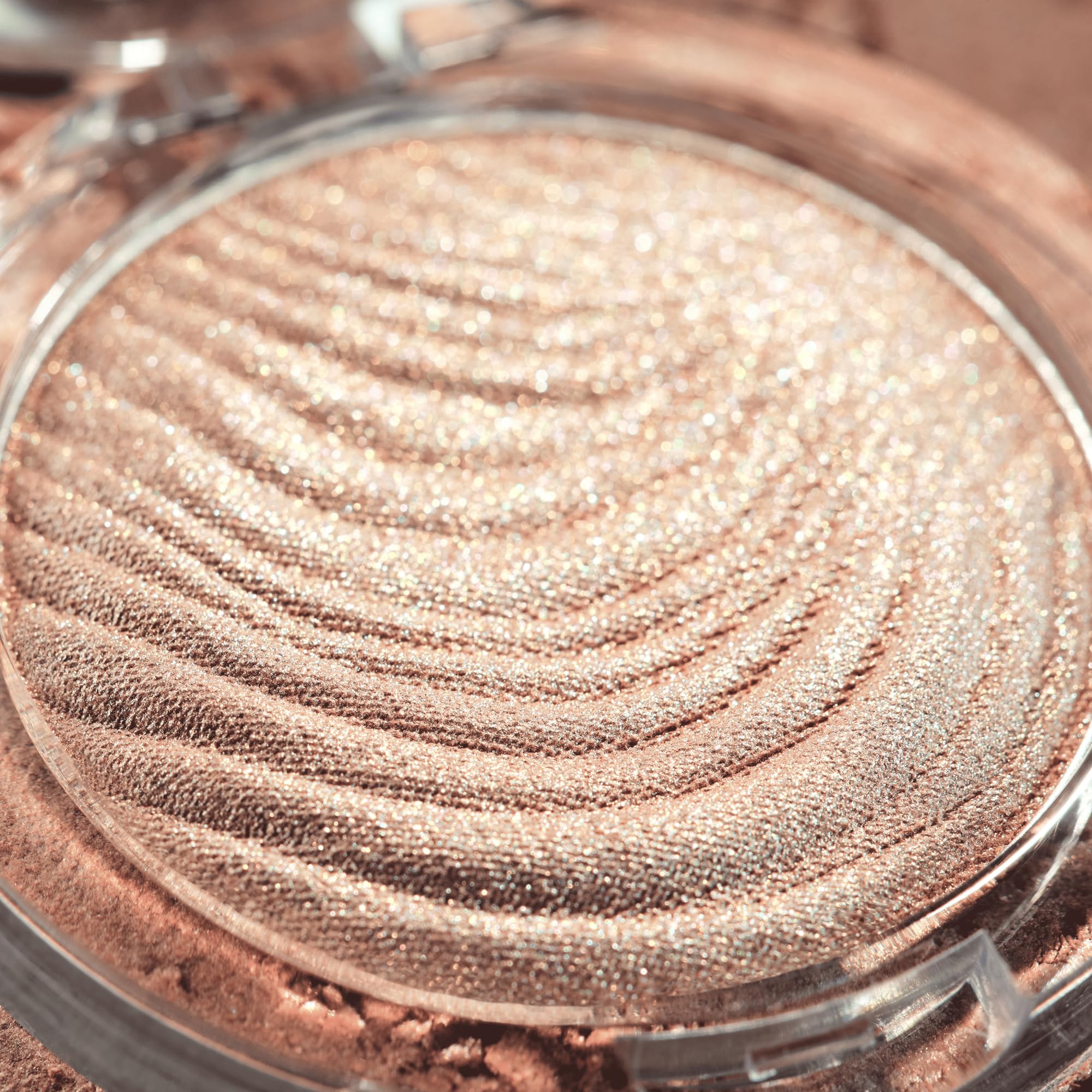 Catrice held in hand for size comparison, showing portable highlighter convenience