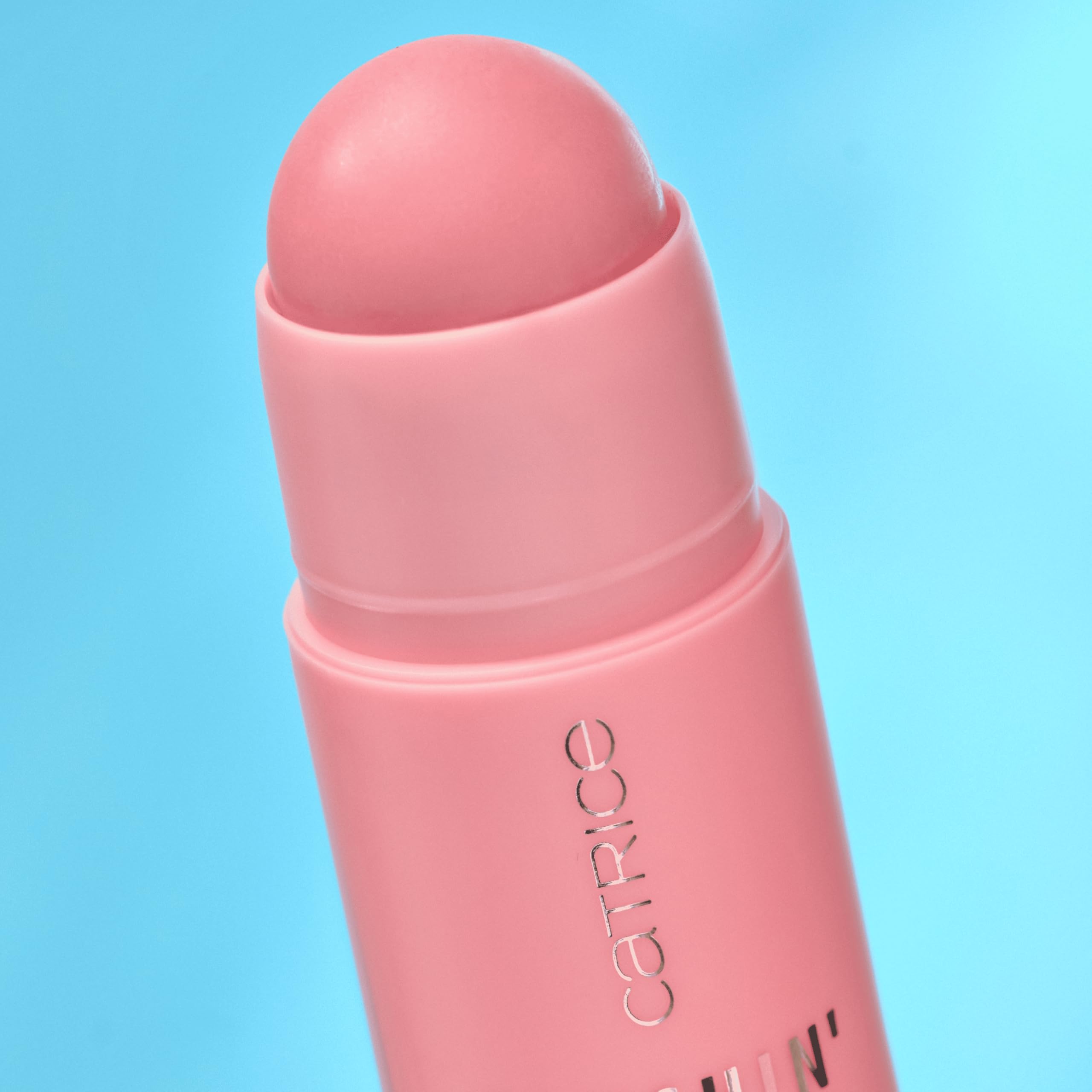 Catrice Blushin' Charm being applied to cheek for a dewy finish
