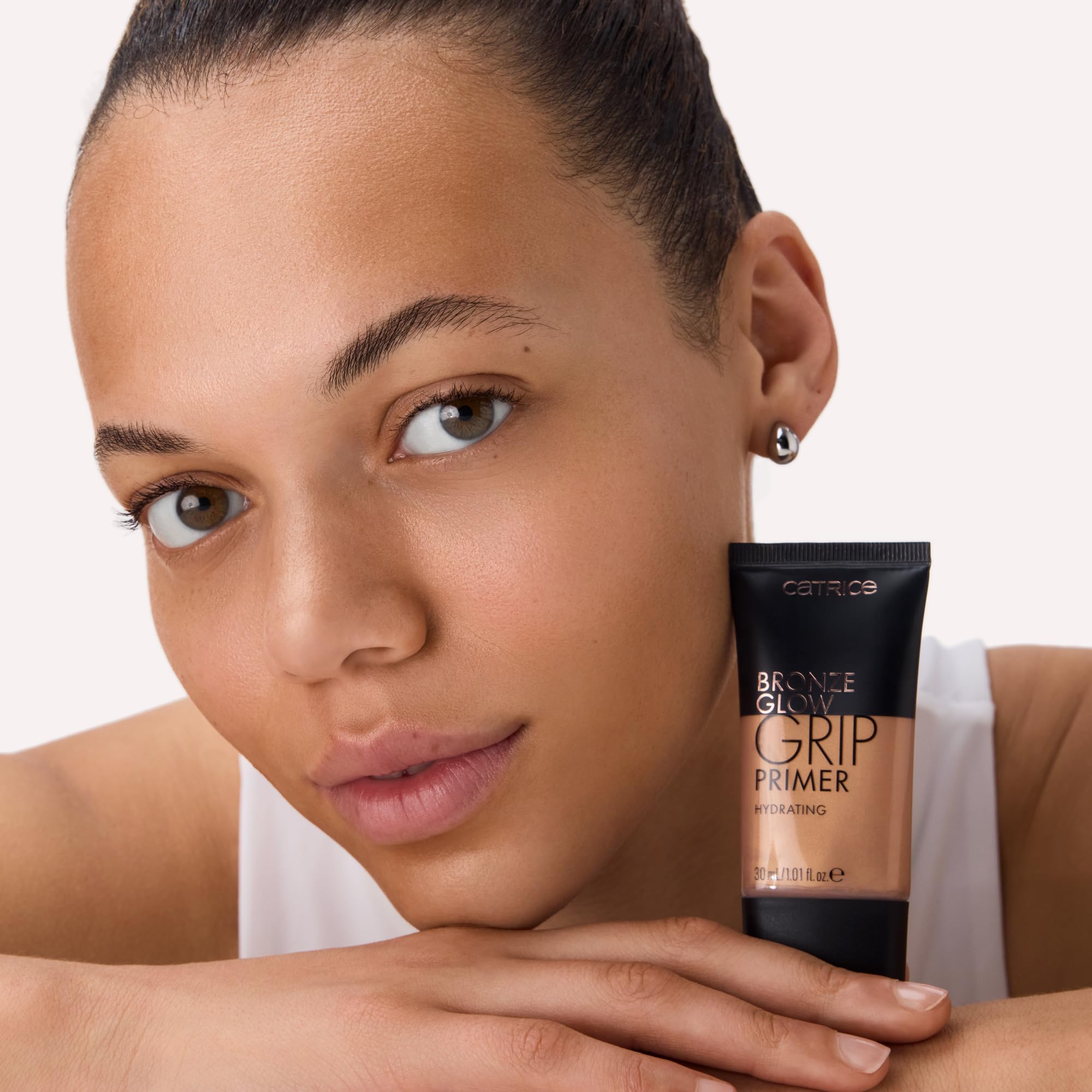 Catrice on-skin swatch revealing warm tinted finish and instant sun-kissed radiance