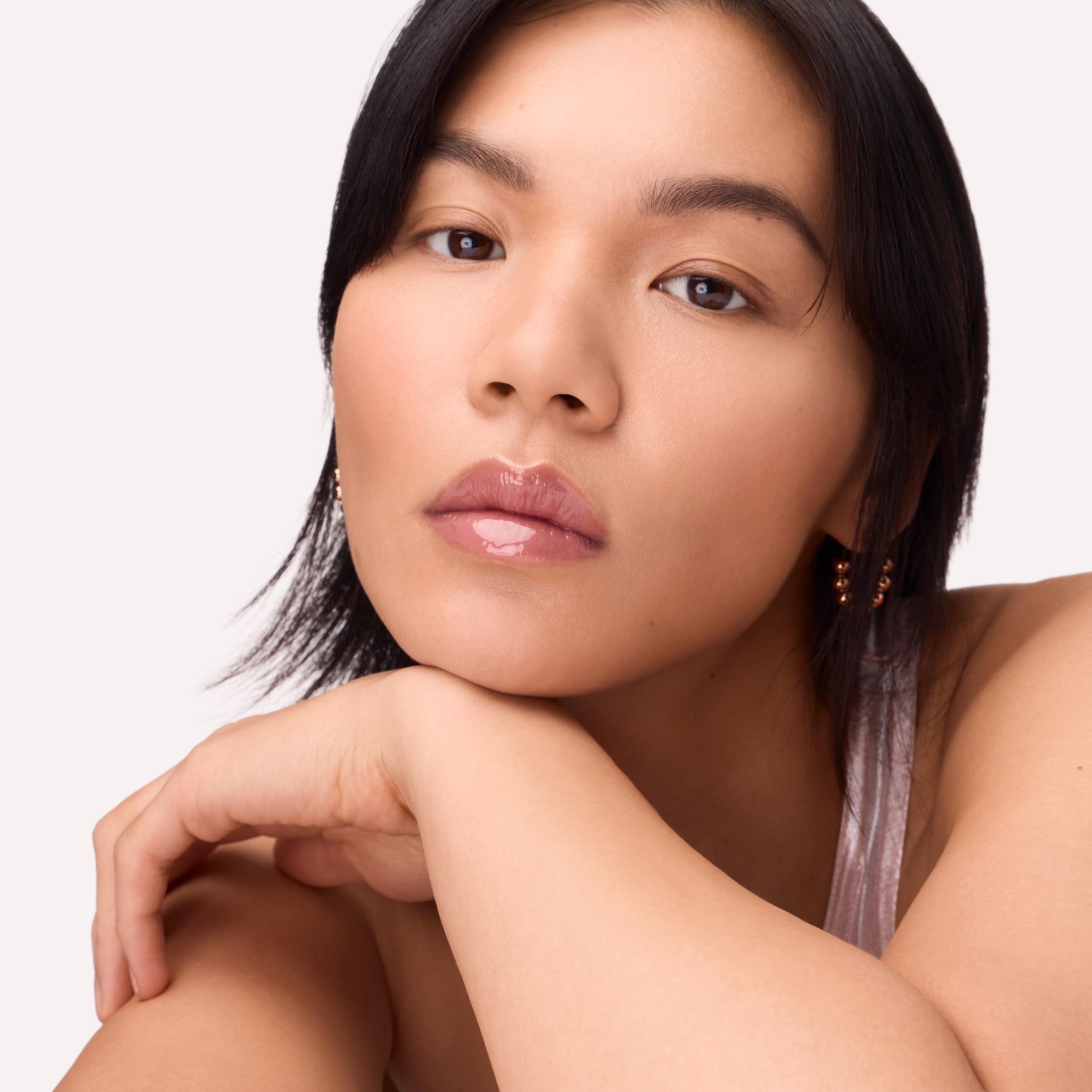 Catrice gloss inside a makeup bag suggesting easy on-the-go touch-ups