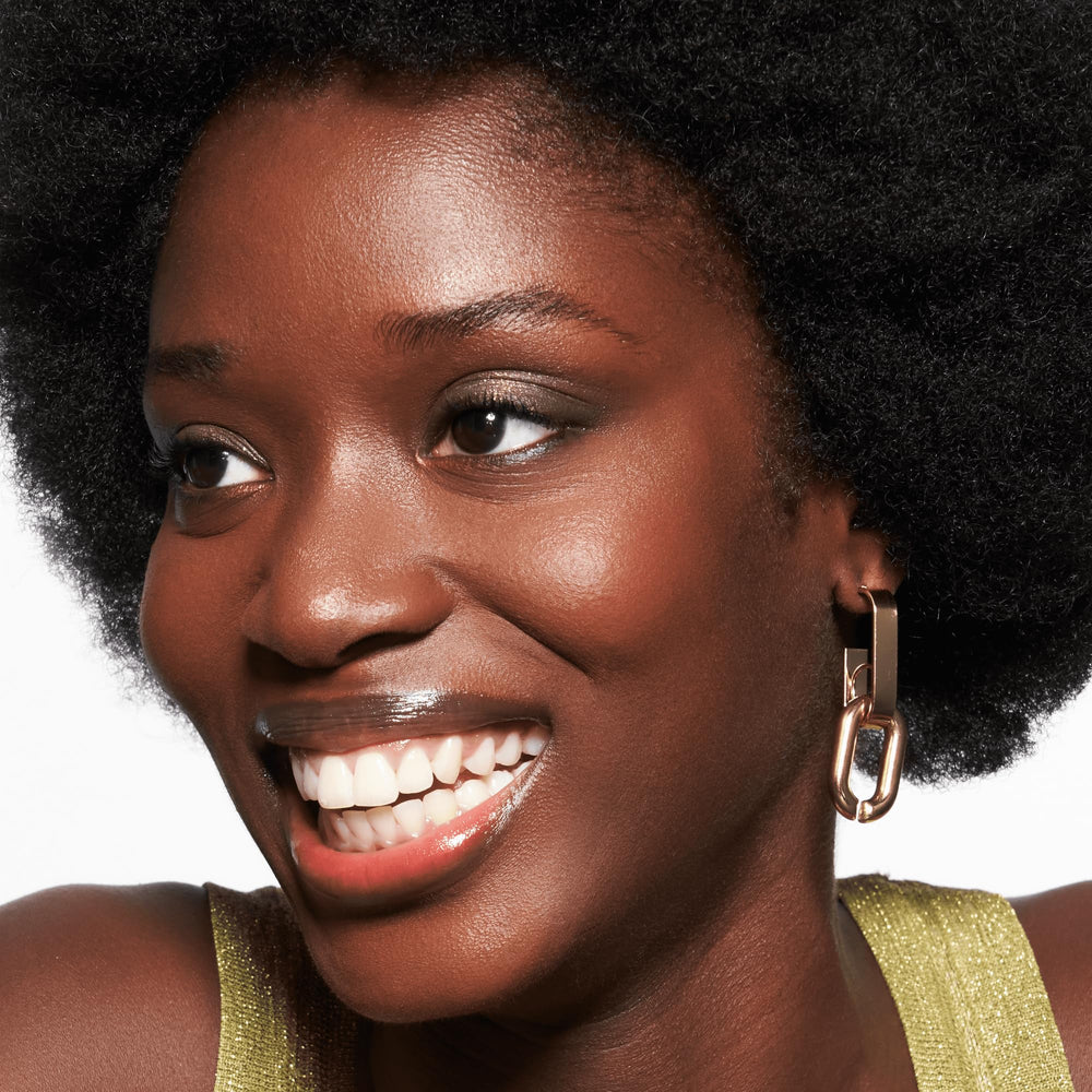 Split-face image with Catrice primer: visible smoother texture and glow