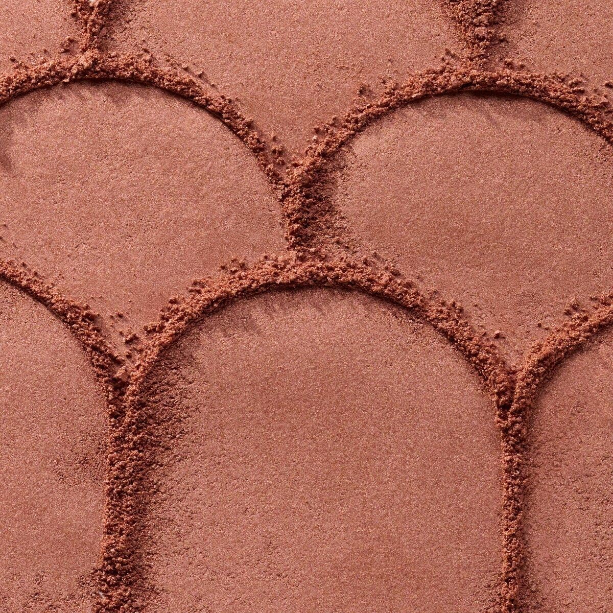 Catrice blush being applied with a brush, demonstrates easy, natural blending