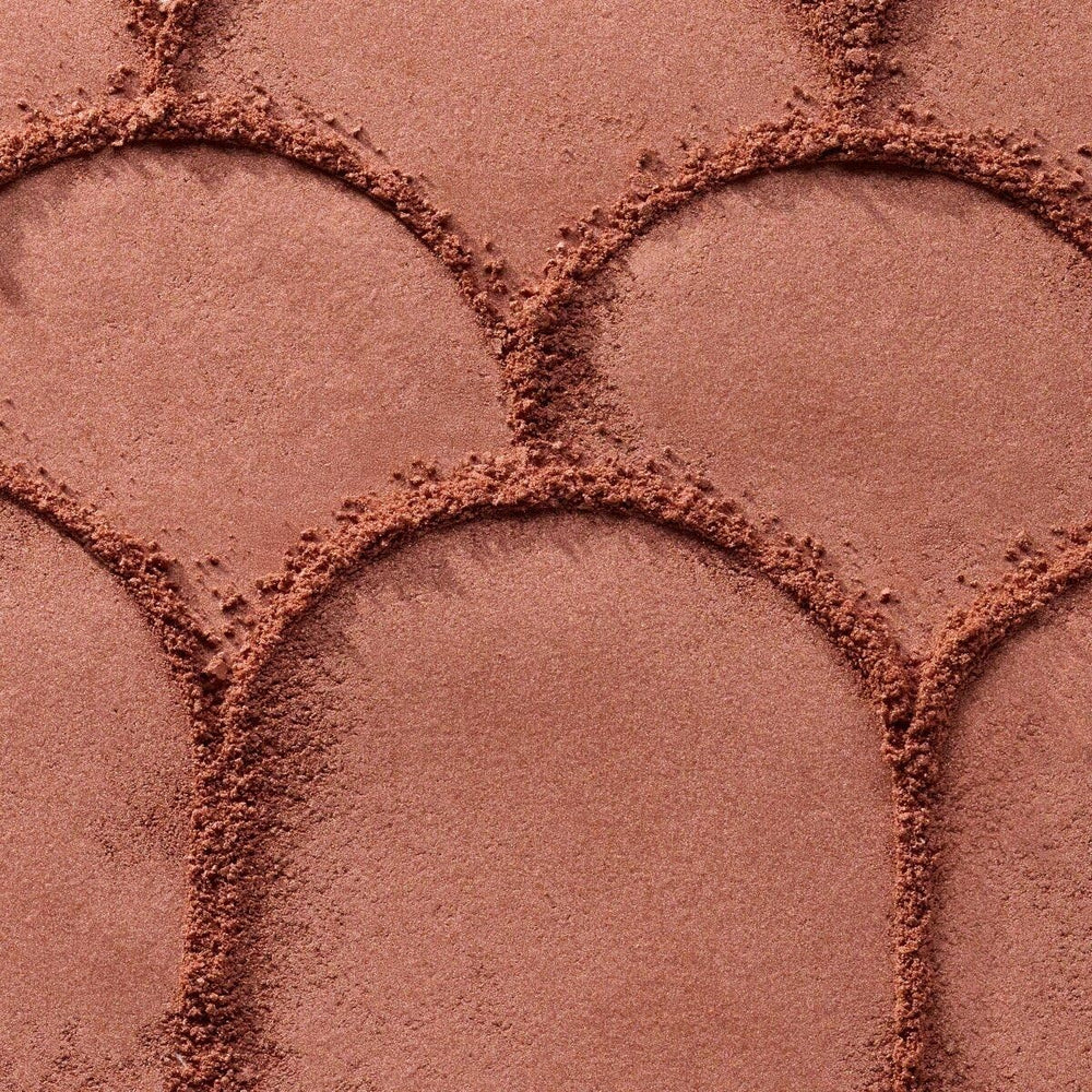Catrice blush being applied with a brush, demonstrates easy, natural blending