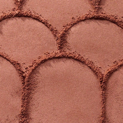 Catrice blush being applied with a brush, demonstrates easy, natural blending