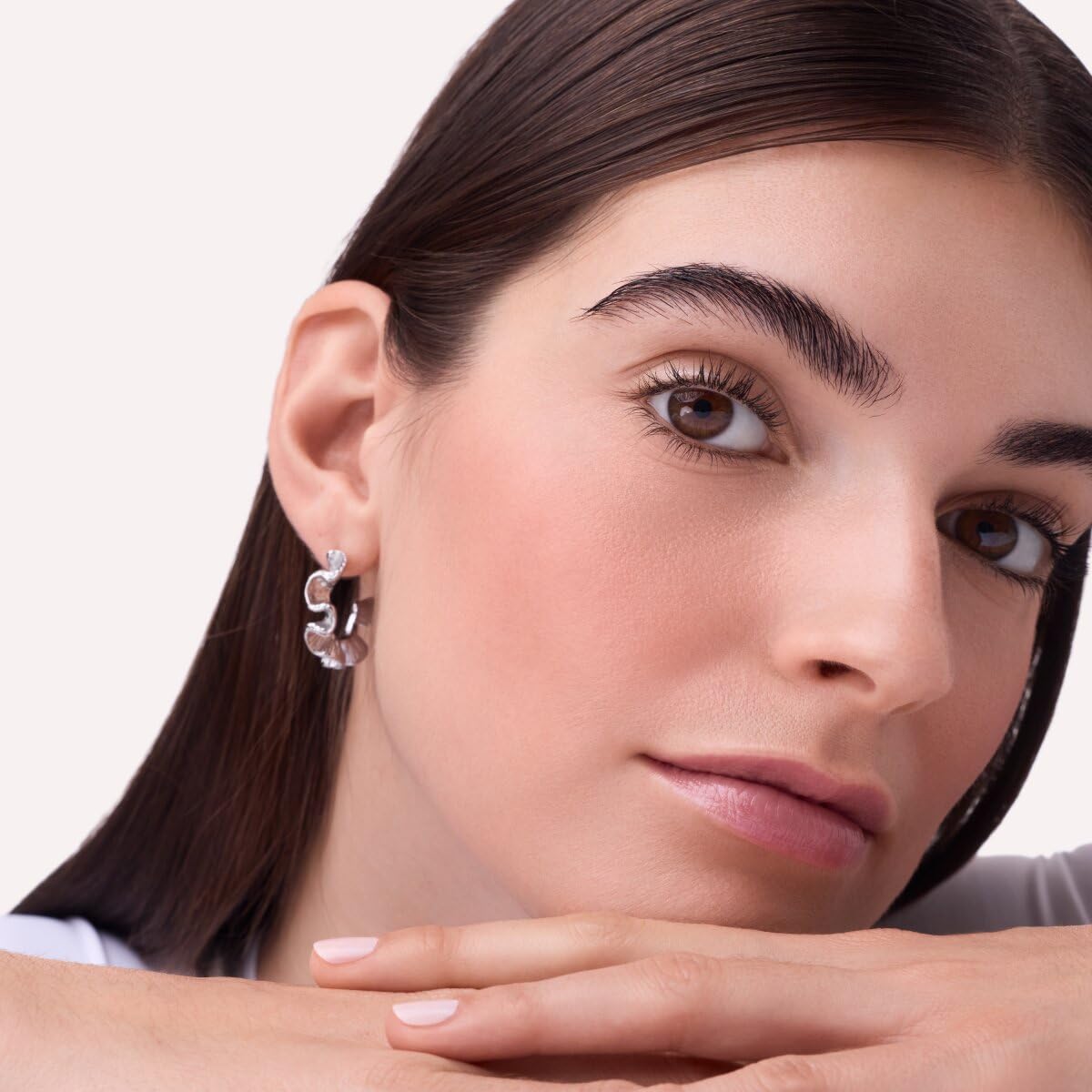 Catrice brush applying blush to cheek showing effortless blend benefit