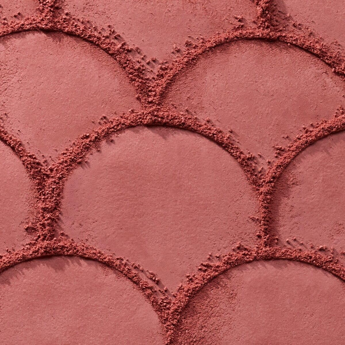 Catrice swatch on arm illustrating buildable berry color payoff benefit