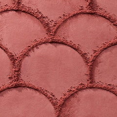 Catrice swatch on arm illustrating buildable berry color payoff benefit