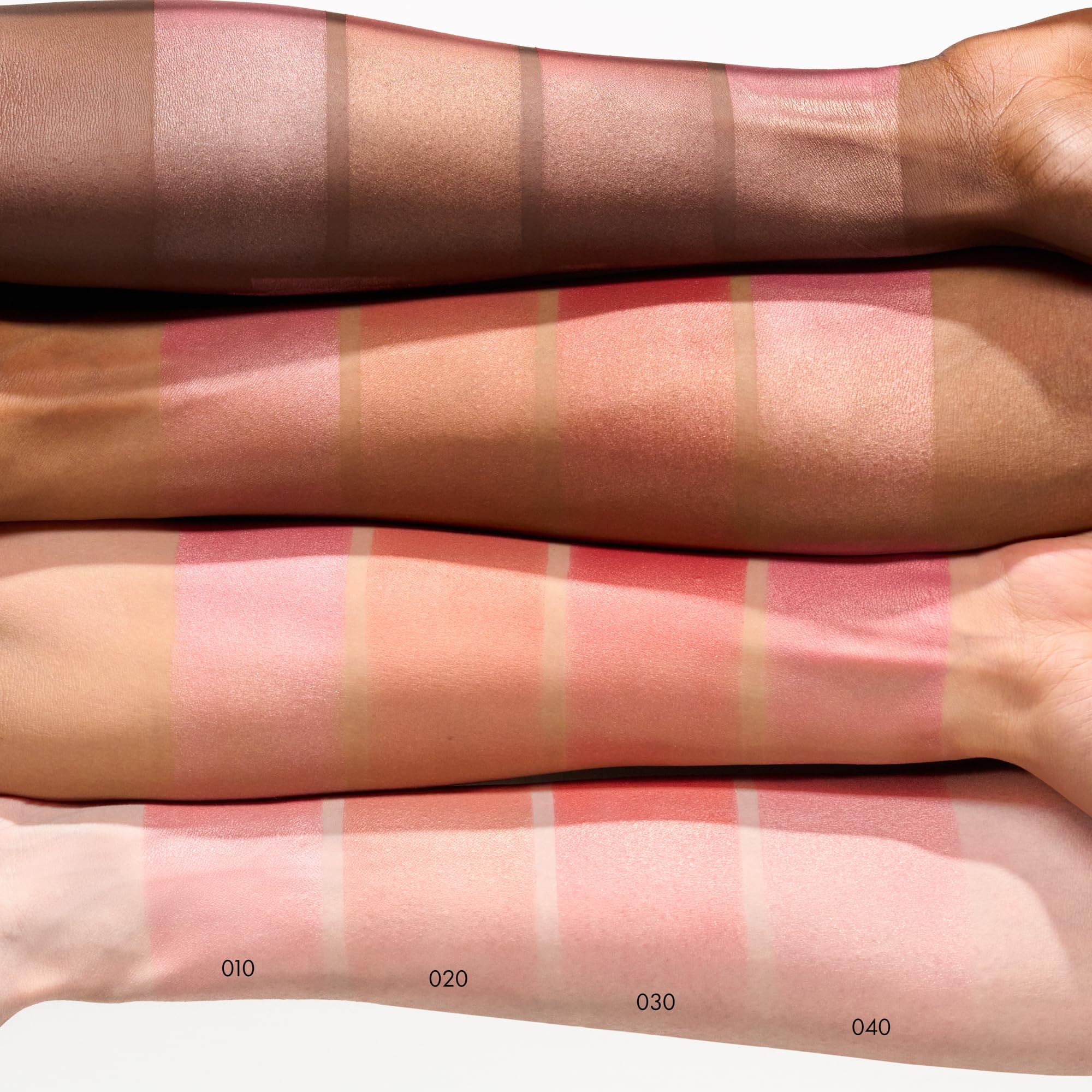 Catrice blush swatched on forearm illustrating buildable berry color benefit