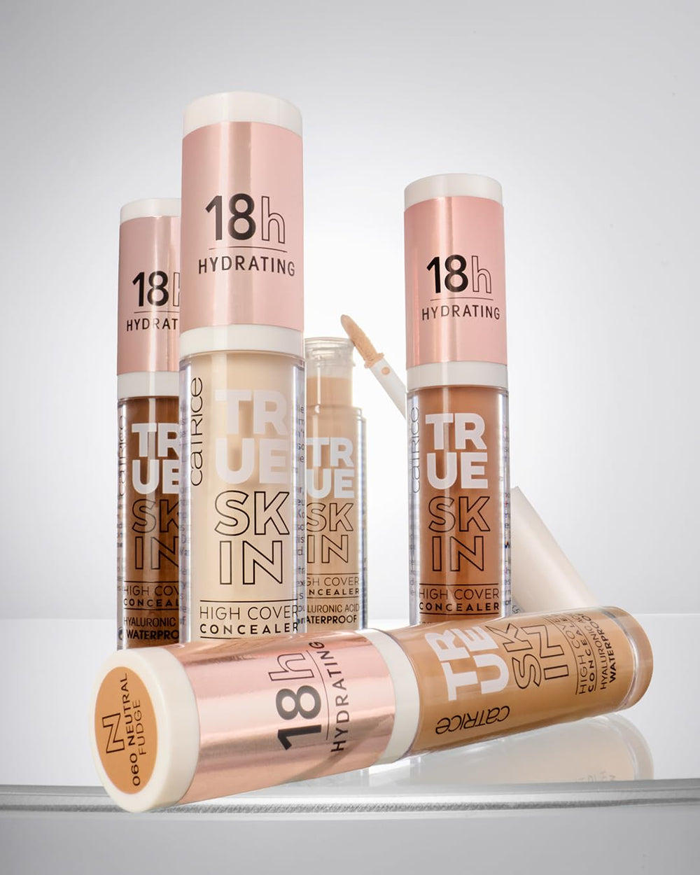 Size comparison of Catrice True Skin next to a tube for scale and travel-ready benefit