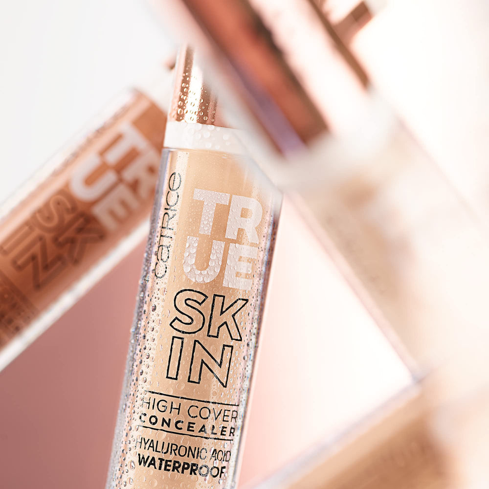 Catrice True Skin beside ruler to show product size for travel-friendly convenience