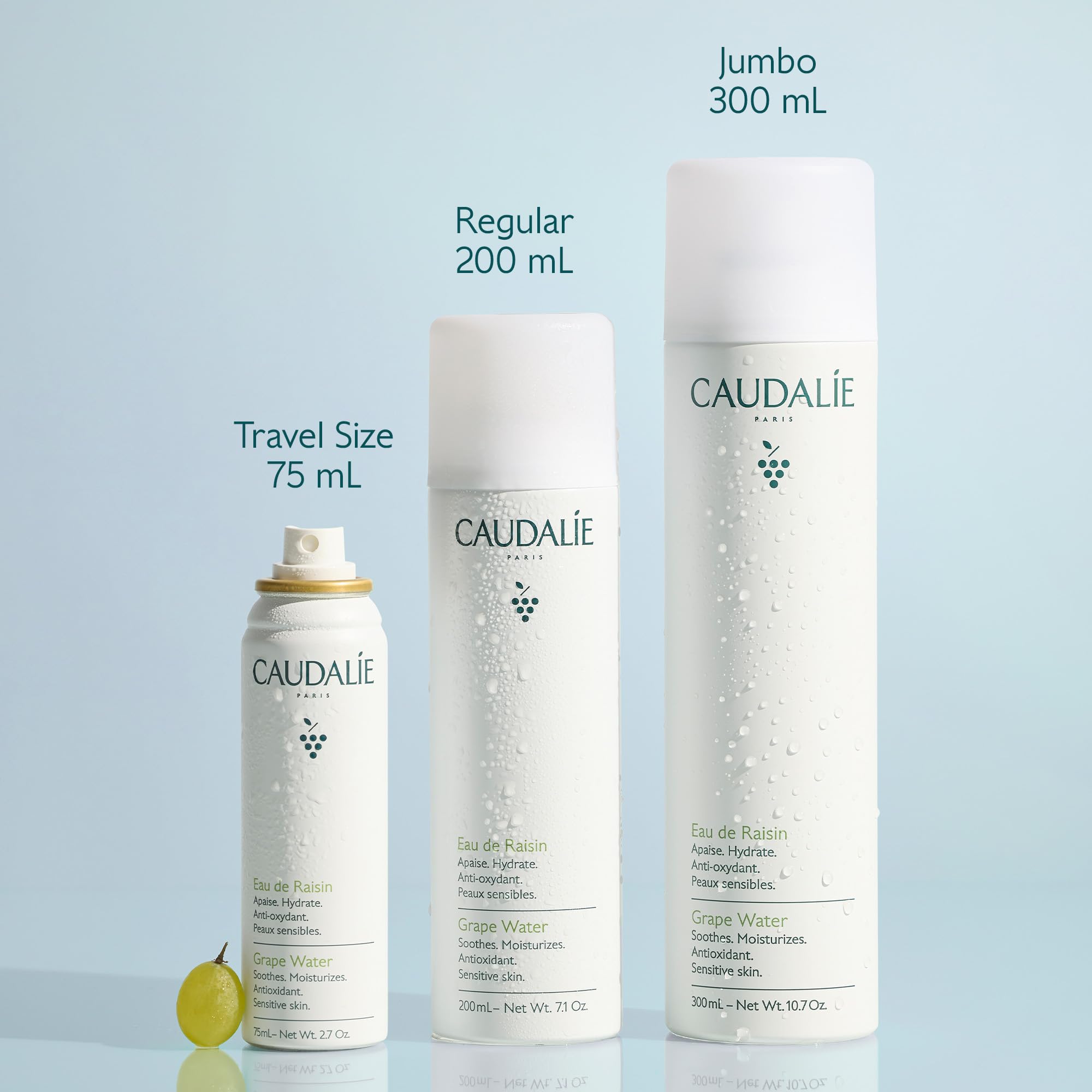 Caudalie grape water held in hand showing 75 mL travel-friendly size