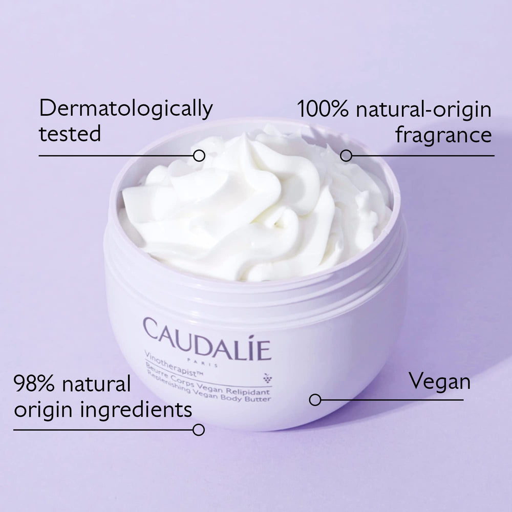 Caudalie applied by hand on arm to soothe dryness and itch