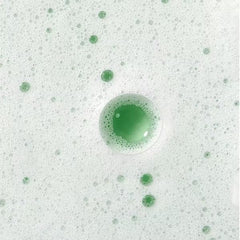 Caudalie open cap and foam being dispensed for correct usage demonstration