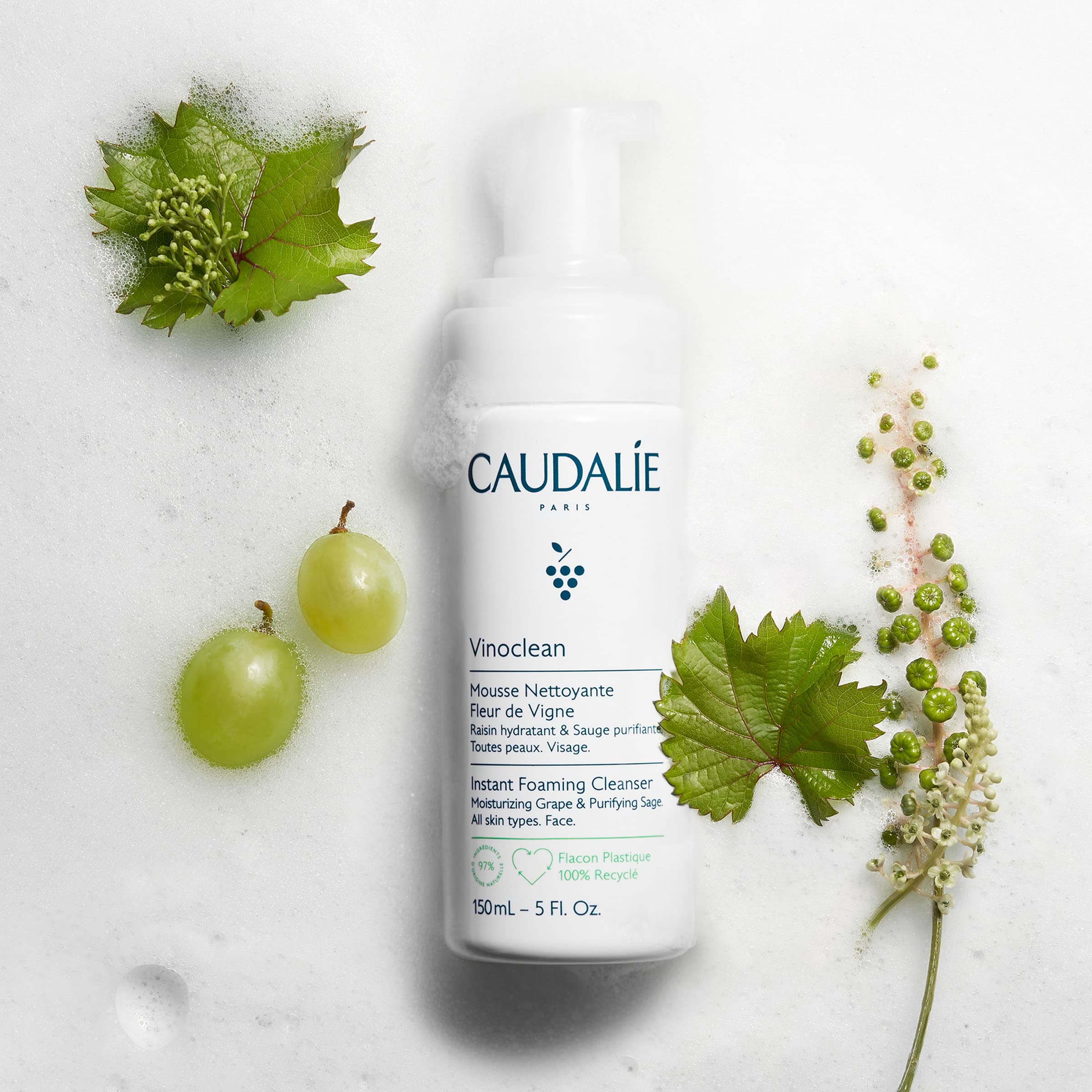 Caudalie pump dispensing foam illustrating easy foaming action and gentle cleanse