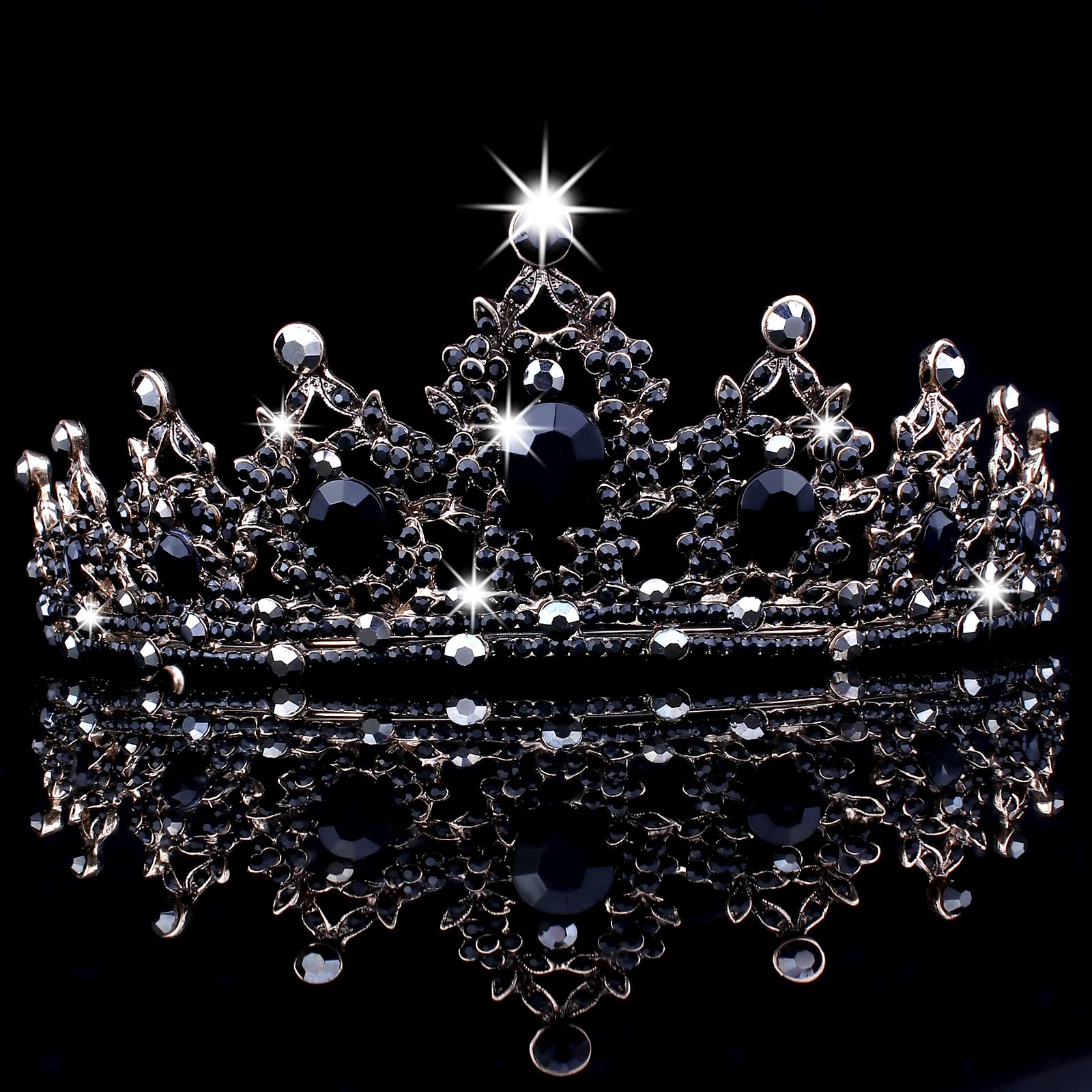 CAVETEE crown held by hand for scale showing compact wearable size