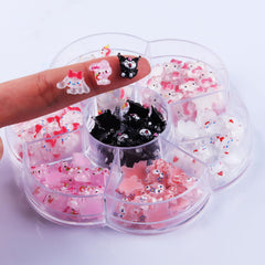 CDBOVID charms scattered on black surface showing color mix and easy selection benefit