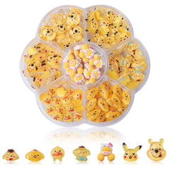 CDBOVID front packaging showing full 140-piece yellow cartoon charms kit benefits