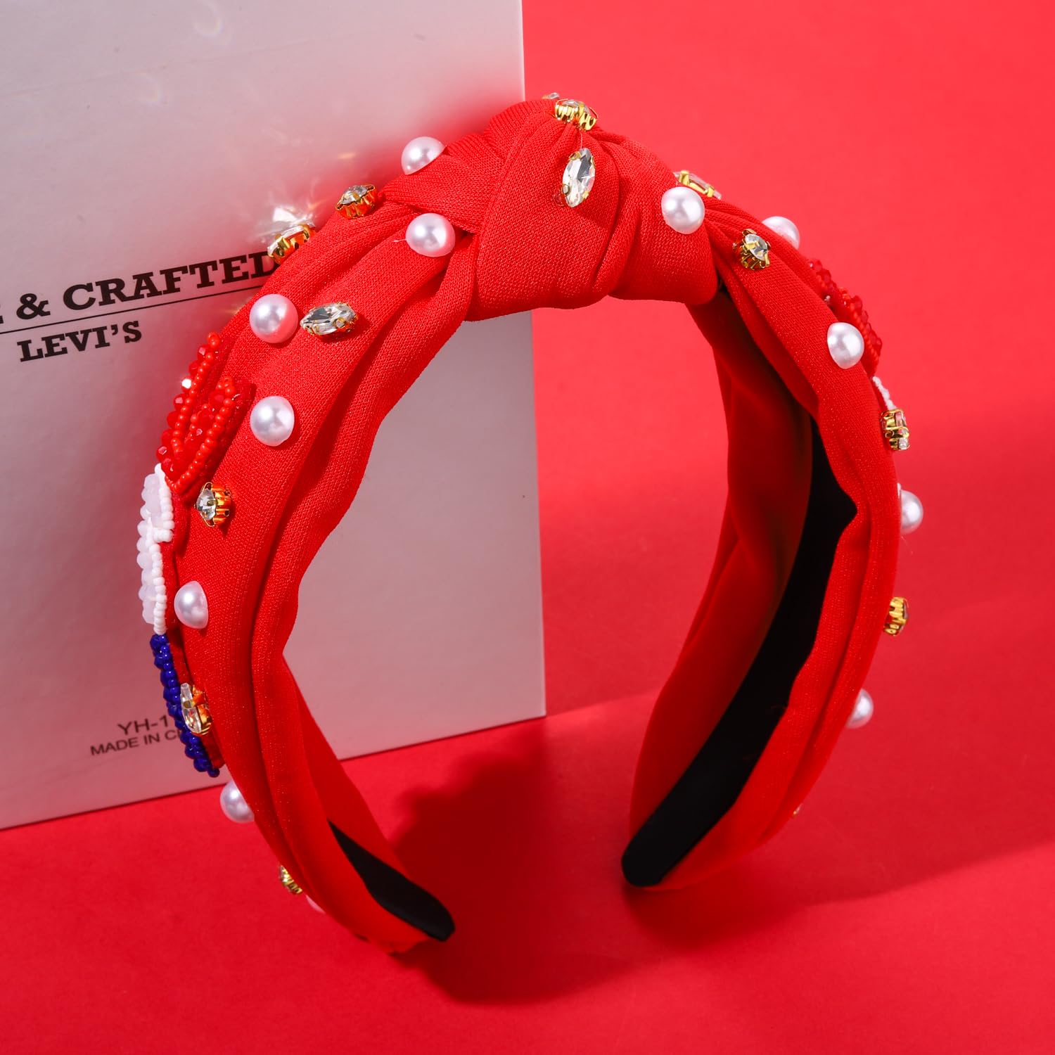 CEALXHENY headband in hand to show scale and easy portability