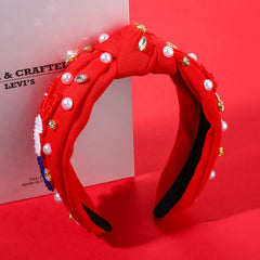CEALXHENY headband in hand to show scale and easy portability