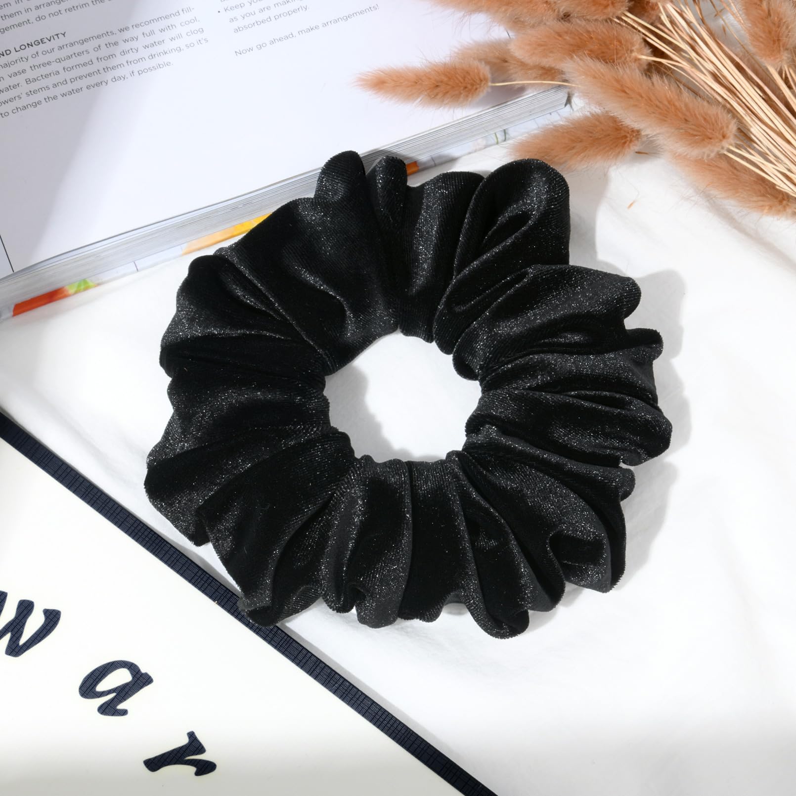 CEELGON scrunchie beside hand and ruler showing 6.5-inch diameter scale