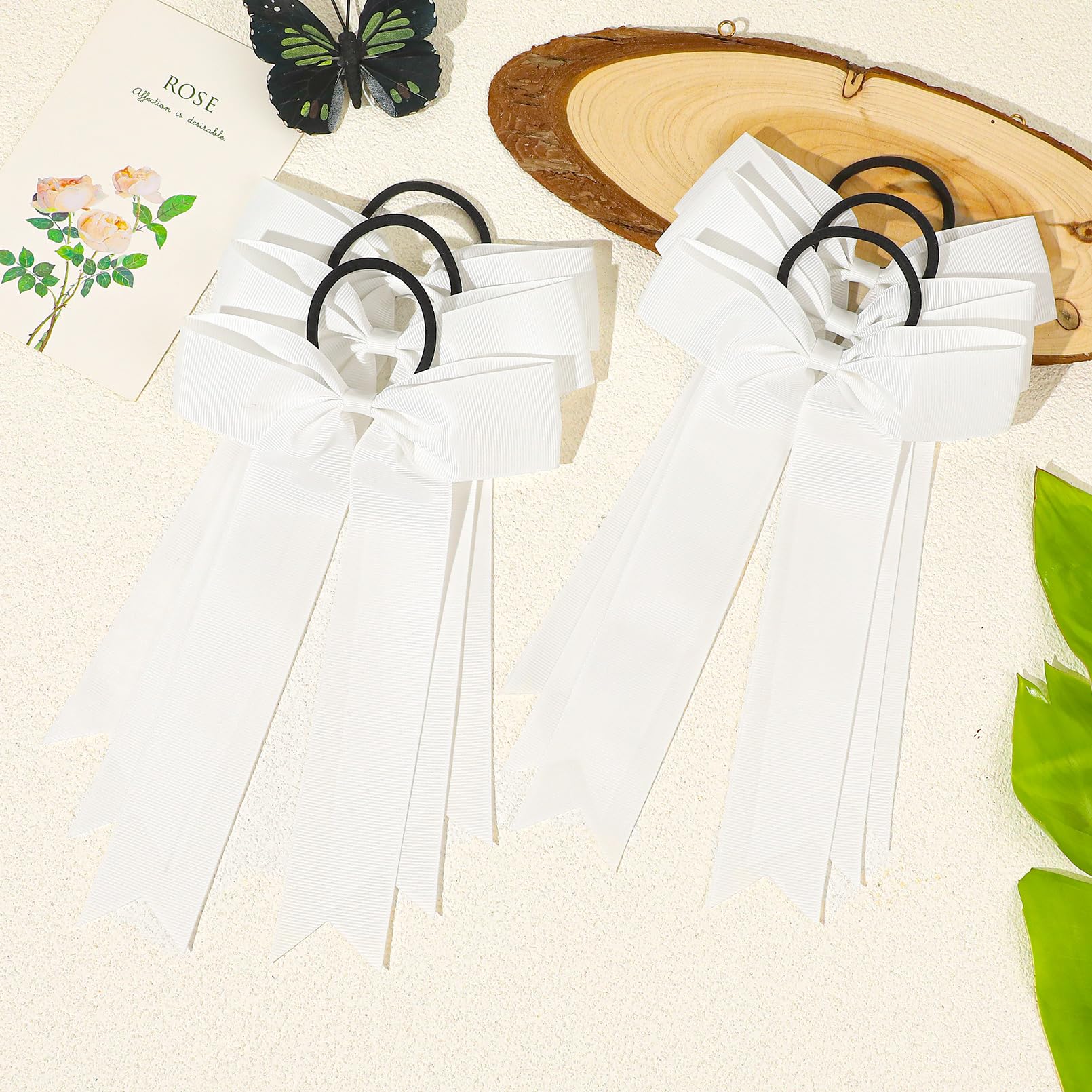 CEELGON bow worn on ponytail during cheer motion demonstrating stability on the move