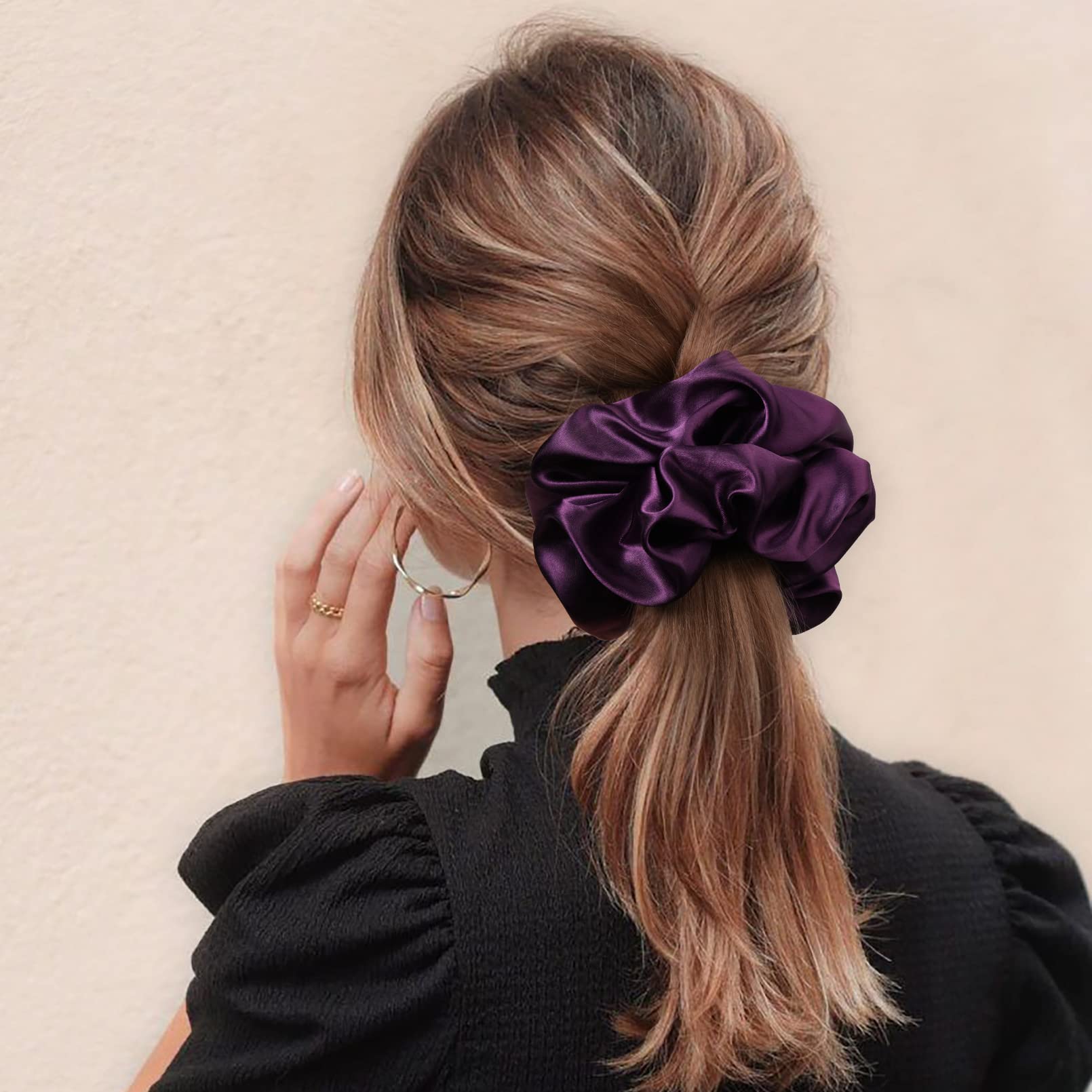 CEELGON jumbo scrunchie creating a soft bun that preserves volume and reduces dents