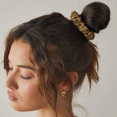 CEELGON scrunchie worn on wrist as bracelet styling for convenience and flair