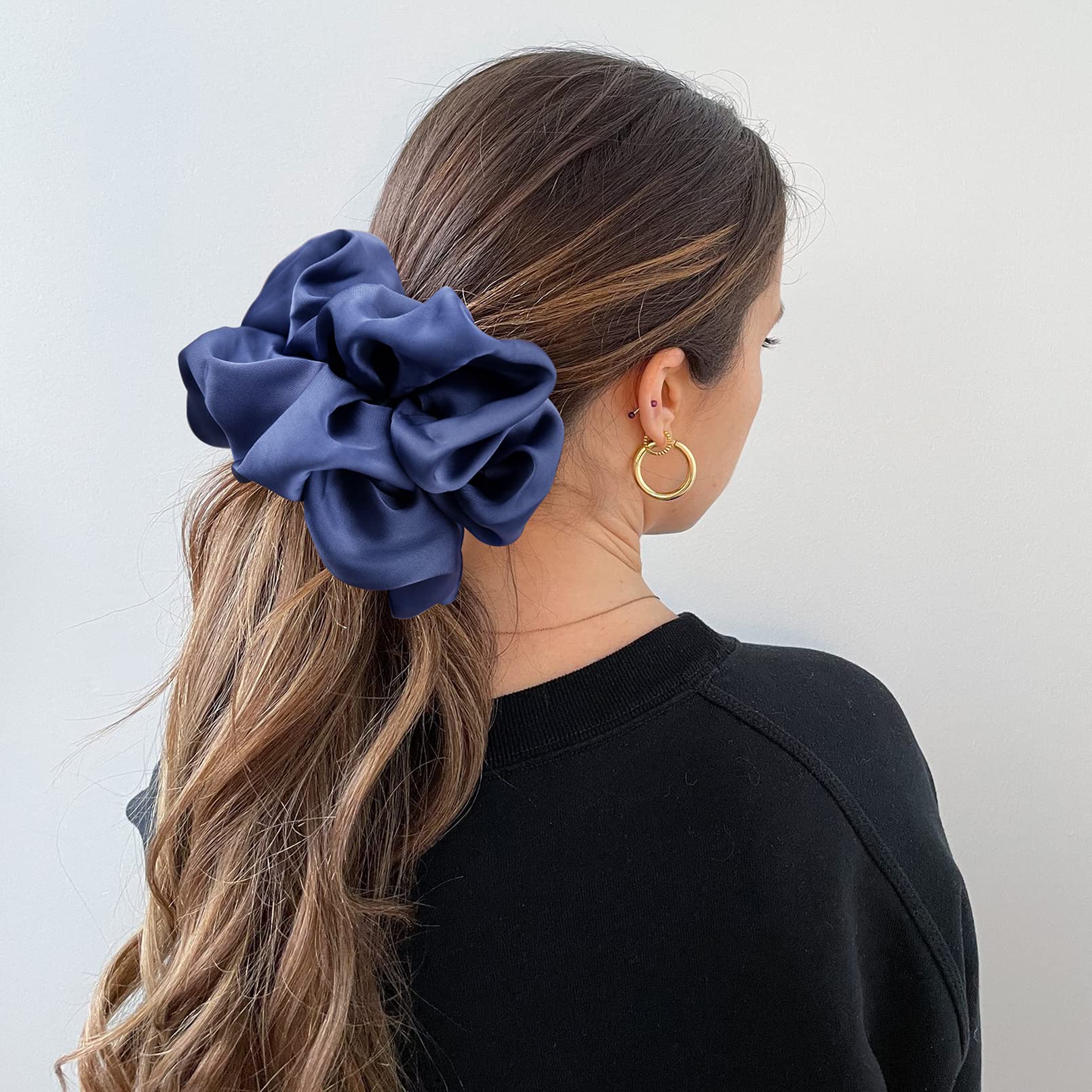 CEELGON scrunchie worn on wrist as accessory and quick hair tie