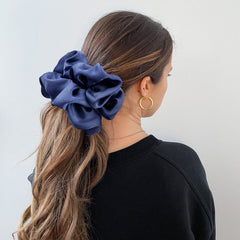 CEELGON scrunchie worn on wrist as accessory and quick hair tie
