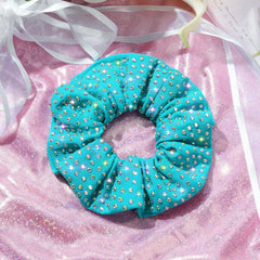 CEELGON scrunchie stretched to illustrate size range and secure elastic hold